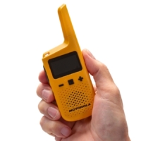 Motorola Talkabout T72 walkie talkie - with hand holding walkie talkie